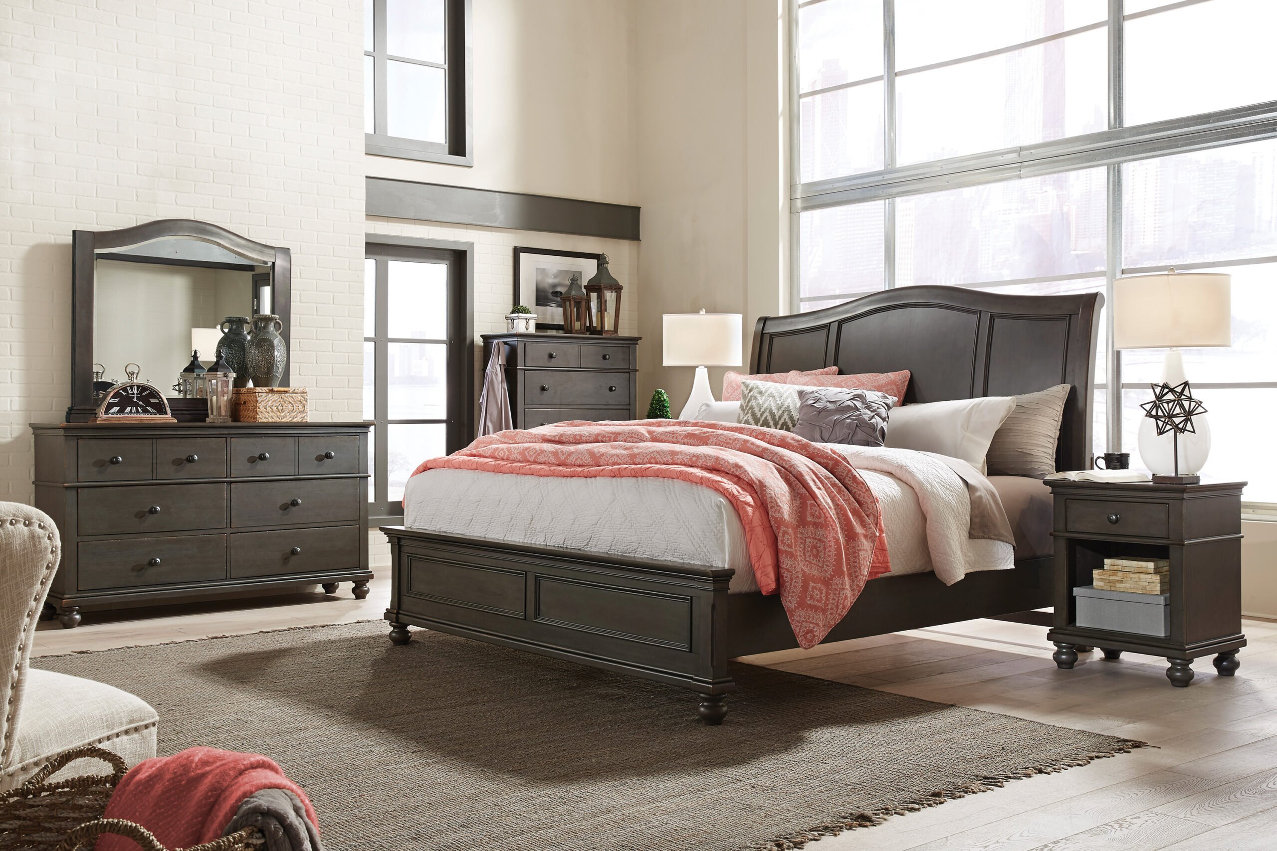 Elegant king-size bed in a classic Kenyan bedroom with tufted headboard and wooden frame from Victoria Homestore