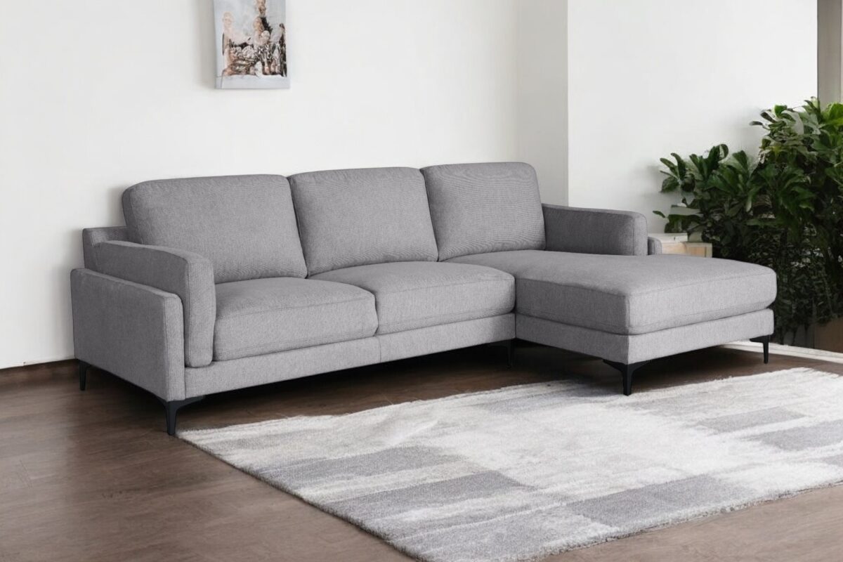 Modern L-shaped sofa set in a stylish Nairobi living room from Victoria Homestore