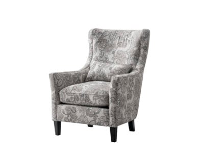 Brettner Accent Chair in Kenyan home interior – stylish upholstered armchair with wooden legs.
