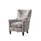 Brettner Accent Chair in Kenyan home interior – stylish upholstered armchair with wooden legs.