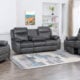 Piperton Dark Grey 6 Seater Powered Recliner Set with extended motorized seats in a contemporary living room setting.