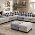 Cream and blue corner sectional sofa with matching ottomans in a modern living room
