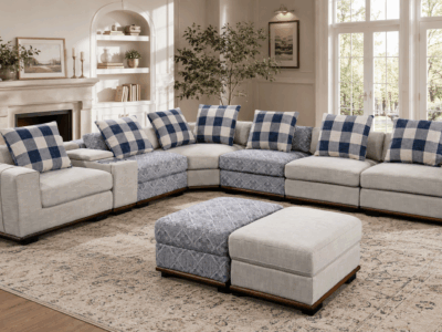 Cream and blue corner sectional sofa with matching ottomans in a modern living room