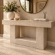 Marble stone console table with open lower shelf in a modern living room