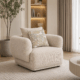Alto single sofa in beige with rounded arms and decorative cushions