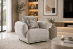 Alto single sofa in grey with rounded arms and decorative cushions