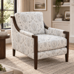 Koala accent chair with ivory patterned upholstery, dark wooden frame and cushioned seatKoala accent chair with ivory patterned upholstery, dark wooden frame and cushioned seat