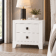 Zecna two-drawer bedside table in white wash with modern angled legs