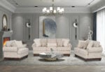 New Belmont 6 seater beige fabric sofa set with rolled armrests, decorative stud detailing and wooden feet.
