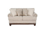 New Belmont 2 seater beige fabric sofa with rolled armrests, decorative stud detailing and wooden feet.