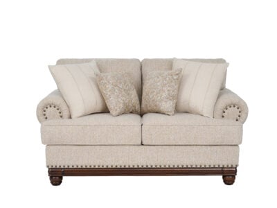 New Belmont 2 seater beige fabric sofa with rolled armrests, decorative stud detailing and wooden feet.