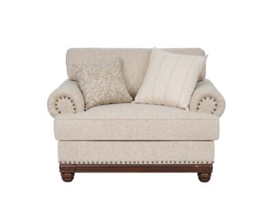 New Belmont single beige fabric sofa with rolled armrests, decorative stud detailing and wooden feet.