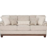 New Belmont 3 seater beige fabric sofa with rolled armrests, decorative stud detailing and wooden feet.
