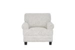 Niki single-seater grey fabric sofa with plush cushions and wide padded armrests.