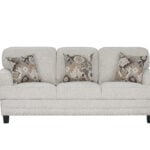 Niki 3 seater grey fabric sofa with plush cushions and contemporary styling.